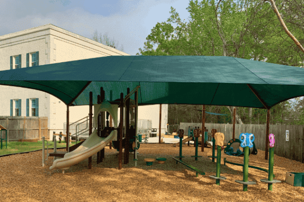AAD Shade Structures_Blog Post (2) A shade structure over an early childhood playground.